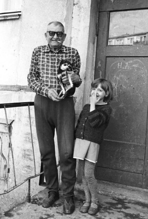Sergey Burasovsky.
Granfather and granddaughter from our house. Magadan. 
1984
