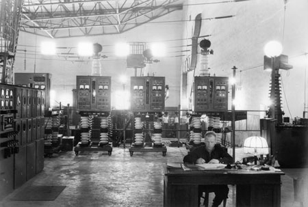 B.Tarakanov, senior electrical engineer on duty, on the working substation of a direct current in a hall of mercury-yapour rectifiers on a transmission line, Kashira. 
1956. 
From the Russian state archive of film-photo documents of Krasnogorsk