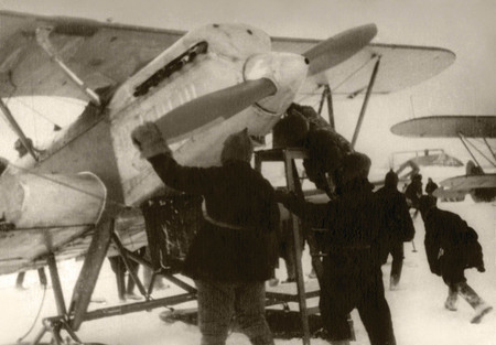 Vladislav Mikosha.
Airplanes are ready to fly to Schmidt camp. It’s time to start an engine. Olutark Cape.
1934. 
Collection of Jemma Firsova-Mikosha