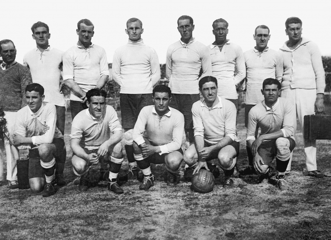 The Uruguayan team before playing the final game of the World Cup against Argentina. At the back row, E. Figoli (masseuse), A. Gestido, J. Nasazzi, E. Ballesteros, E. Mascheroni, J.L. Andrade, L. Fernandez, L. Grecco (masseuse). At the front, P. Dorado, H. Scarone, H. Castro, P. Cea, S. Uriarte. Centenario Stadium. July 30th, 1930.