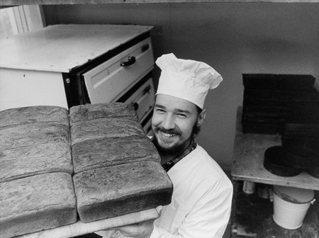 Boris Kuvshinov.
Antarctica. Boris Gurichev - cook of the “Molodejnaya” station – with bread baked for the participants of 25th Soviet Arctic expedition. 
1980