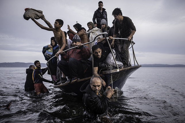 Sergey Ponomarev.
Migrants arrive by a Turkish boat near the village of Skala, on the Greek island of Lesbos. Monday 16 November 2015. Europe Migration Crisis series. 2015