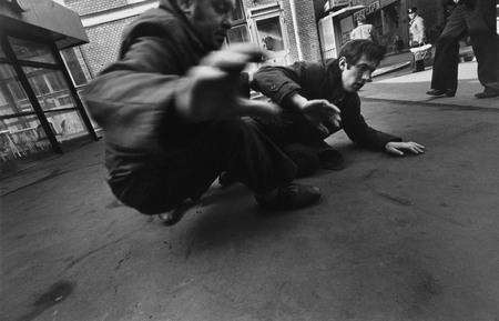 Yuriy Ribchinskiy.
Drunken men fall down. Kirov (Miasnitskaya) street, Moscow. 
1984