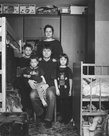 Vladimir Mishukov.
The family of an imposer.
From a series “The cult of family”. Moscow. 
2003-2005.
The collection of the Moscow House of Photography, author’s collection