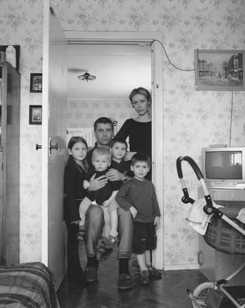 Vladimir Mishukov.
The family of a guard.
From a series “The cult of family”. Moscow. 
2003-2005.
The collection of the Moscow House of Photography, author’s collection