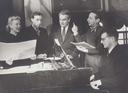 Viktor Dombrovsky.
On record of music to film “The meeting on Elba”. 
1949. 
From left to right: Lubov Orlova, Erast Garin, Grigory Alexandrov, Alexander Tcfasman, Dmitry Shostakovich. 
The Russian state archive literature and art