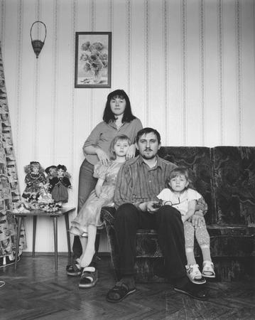 Vladimir Mishukov.
The family of a Xerox operator.
From a series “The cult of family”. Moscow. 
2003-2005.
The collection of the Moscow House of Photography, author’s collection
