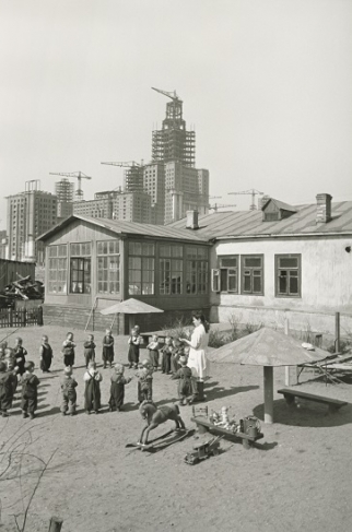 Emmanuil  Evzerikhin. 
Kindergarten with Moscow State University under construction in the background
Moscow, 1952. 
Gelatin silver print from original negative.
Collection of the Multimedia Art Museum, Moscow.