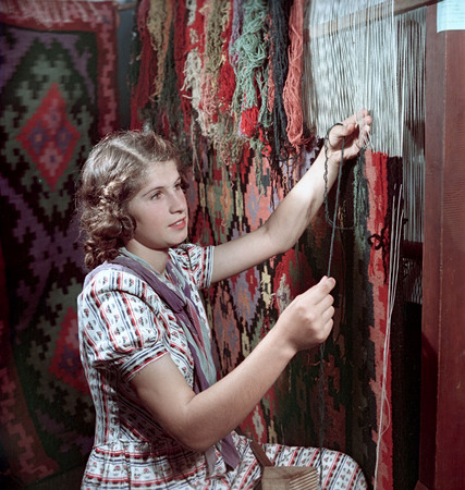 Yakov Rumkin.
Moldavia. Galina Stadnik – the best carpet-maker at Kotovsky artel (town of Tiraspol) fulfill the plan for 150%.
1953. 
“Ogonyok” archive