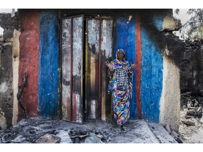 Pascal Maitre.
Chad, 2015.

The village of Ngouboua on Lake Chad was the target of Boko Haram’s first attack in Chad. On February 13, 2015, 46 armed men in four dugouts with outboard motors ambushed the village at 3 o’clock in the morning, targeting and killing the district officer and setting fire to many of the homes.

© Pascal Maitre/Myop/Panos
