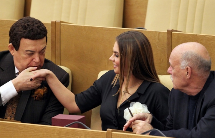 Dmitry Dukhanin.
Member of the Committee for Information Policy Iosif Kobzon, Deputy Chairwoman of the Department of Youth Affairs Alina Kabaeva, and Member of the Committee for Information Policy Stanislav Govorukhin Attend Plenary Session of the Russian State Duma. Moscow, December 2010.
Courtesy Kommersant