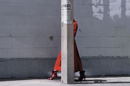 Guy Bourdin.
Red Coat. Charles Jourdan. 
Winter 1975. 
© The Guy Bourdin Estate