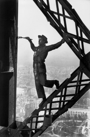 Mark Riboud.
Paris. The house painter on the Eiffel Tower. 
1953. 
The collection of the author, Paris