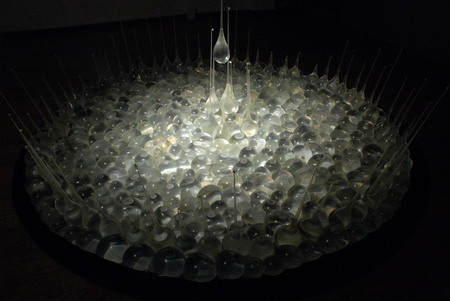 Alexei Kostroma.
View of installation “Speed of Falling”. 
2008. 
Multimedia installation.
(video, sound, natural latex, water)