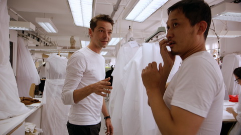 Pieter Mulier and Hong-bo Li in the haute couture atelier. Credit: CIM Productions