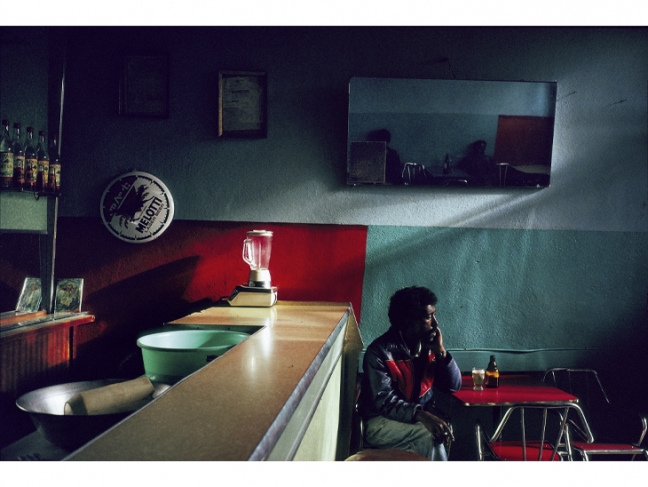 Pascal Maitre.
Eritrea, 1992.

A man, lost in thought, in a bar with clear Italian influence at Asmara. Maybe he does not yet realise that the long war for independence is over.

© Pascal Maitre/Myop/Panos.